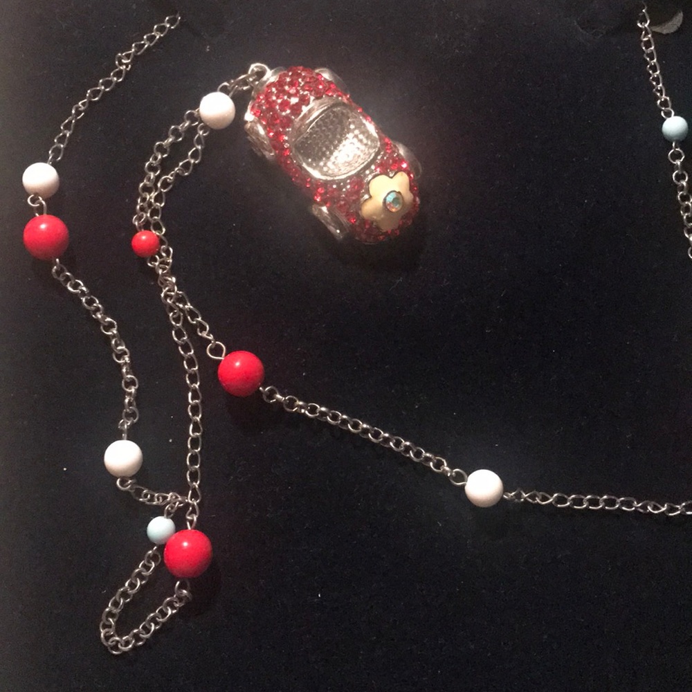 Crystal car charm necklace.